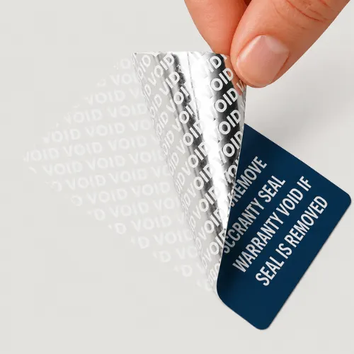 Tamper-evident security sticker with VOID pattern